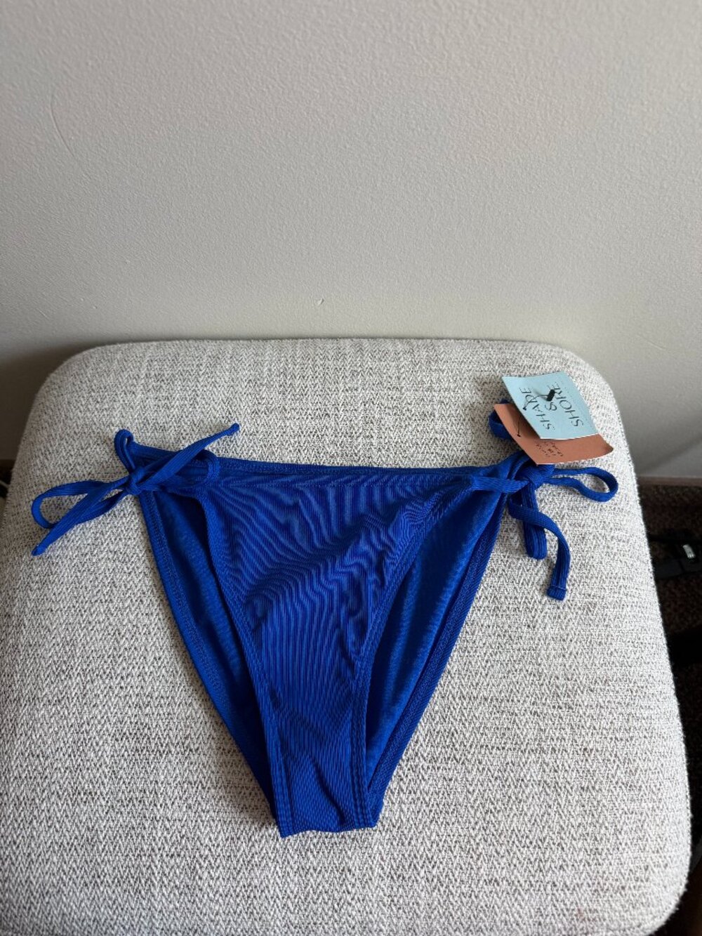 wild fable blue bikini bottom with ribbed fabric and side ties. NWT